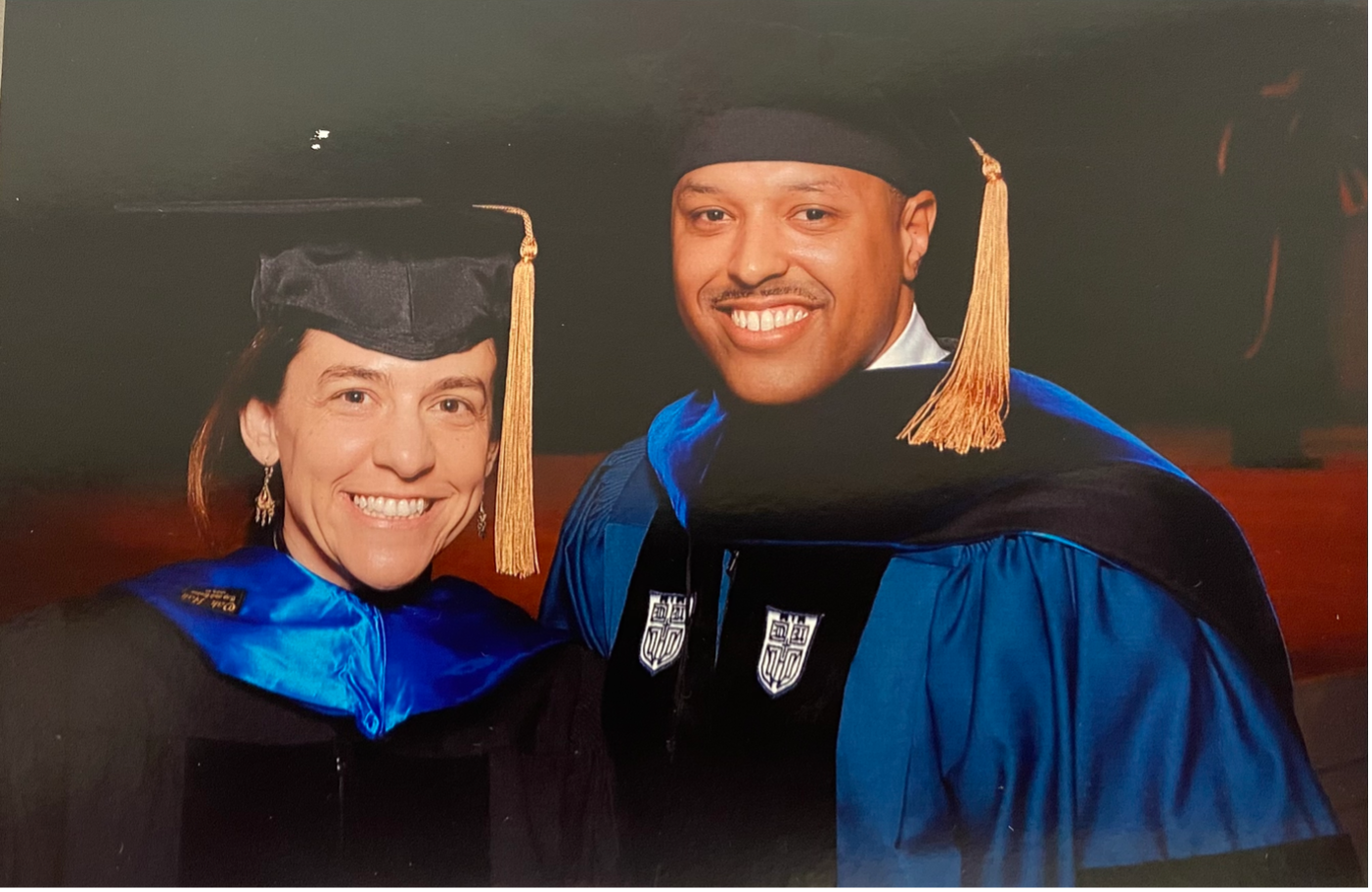 Georgia Tomaras and Kevin Saunders in cap and gown