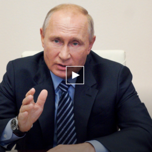 RUSSIAN PRESIDENT VLADIMIR PUTIN GESTURES DURING A VIDEO CONFERENCE MEETING